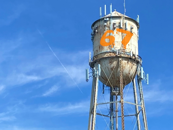 water tower with 67 painted on